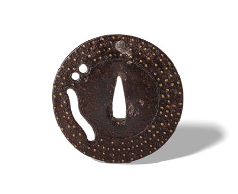 Edo Period, Ca. AD 1603 - 1868. A round iron tsuba featuring a wide rim decorated with evenly spaced gilt dots, creating a te