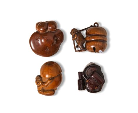 Ca. AD 1700 - 1900. A group of four wood carved netsuke depicting naturalistic subjects including two mushrooms, one signed T