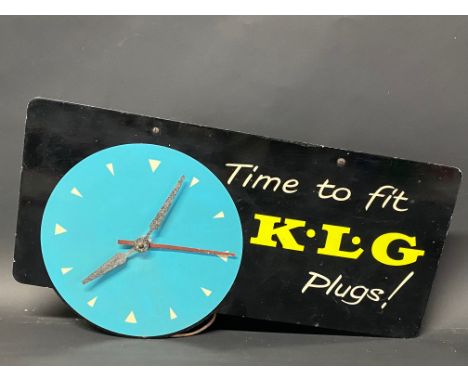 A K.L.G. Plugs garage showroom advertising wall clock, 18 x 10".