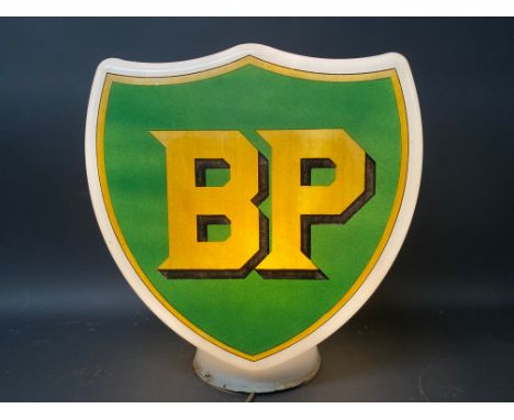 A BP shield shaped glass petrol pump globe by Webb's Crystal, of good colour, dated September 1950, one chip to neck otherwis