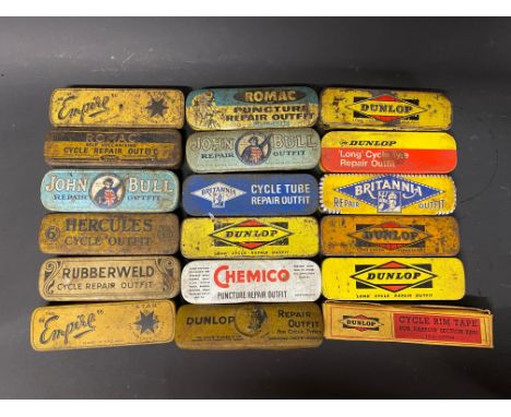 A selection of puncture repair outfit tins, including early Dunlop.