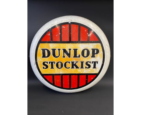 A Dunlop Stockist circular aluminium advertising sign, 36" diameter.