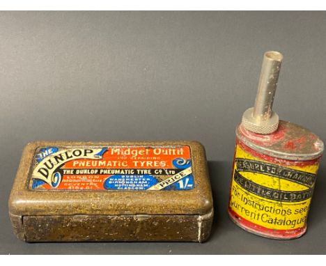 A Dunlop 'Midget Outfit for repairing Pneumatic Tyres' plus a miniature 'measure for charging' tin. 