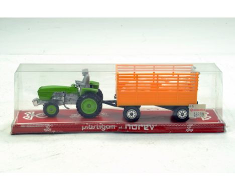 Norev 1/43 Plastic issue No. 105 Renault Tractor and Trailer Set.  Looks to be near mint, likely to have not been previously 