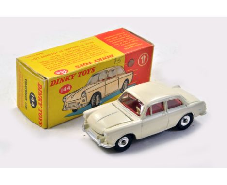 Dinky No. 144 Volkswagen 1500 Saloon with off white body, red interior, silver trim and chrome spun hubs. Generally Excellent