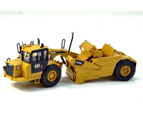 Diecast Masters 1/50 CAT 613G Wheel Tractor Scraper. Looks to be complete, excellent and with original box/boxes. - NOTE THIS