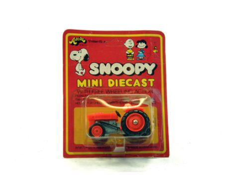 Aviva 1/42 Japan Carded Novelty Snoopy issue Kubota Tractor. Looks to be near mint, likely to have not been previously unboxe
