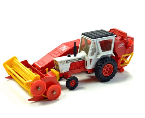 Corgi David Brown 1412 Tractor with JF Combine Attachment.  No Box/Boxes but complete and excellent. No apparent faults.