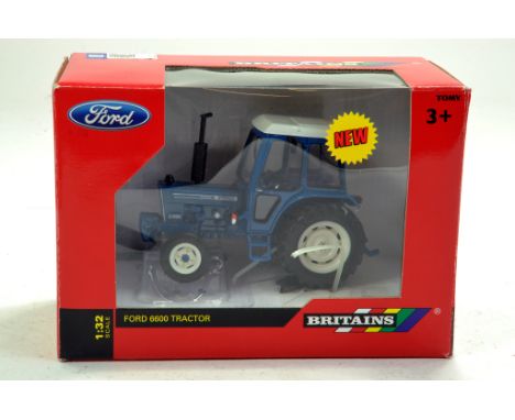 Britains 1/32 Ford 6600 Tractor.  Looks to be complete, excellent and with original box/boxes.