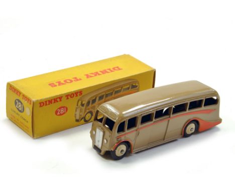 Dinky No. 281 Luxury Coach. Fawn body with orange trim and flashes, light tan hubs. Generally Excellent in very good box.