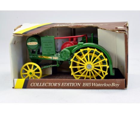 Ertl 1/16 John Deere 1915 Waterloo Boy Tractor. Looks to be excellent with box.