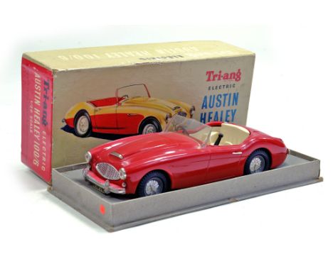 Triang 1/20 scale electric model of the Austin Healey 100/6 in red. Displays excellently in very good box.