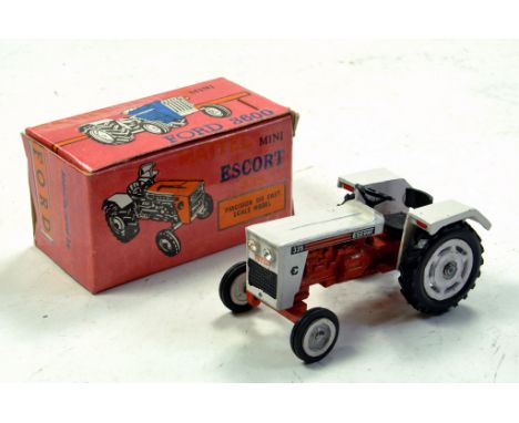 Milton Maxwell Mini 1/43 Escort 335 Tractor.  Looks to be complete, excellent and with original box/boxes.
