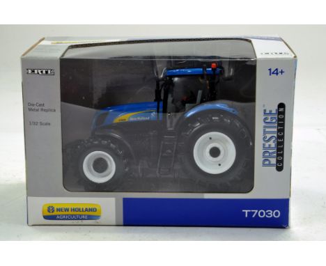 Ertl 1/32 Prestige New Holland T7030 Tractor.  Looks to be complete, excellent and with original box/boxes.
