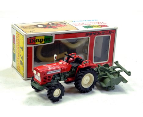 Diapet Yonezawa 1/23 Yanmar YM3310 Tractor and Roto-Tiller. Rare but roto-tiller missing one guide wheel and one broken but a