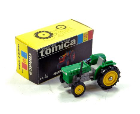 Tomica Tomy 1/42 No. 92 Kubota Tractor in Green. Looks to be complete, excellent and with original box/boxes.