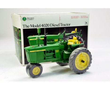 Ertl Precision 1/16 John Deere Model 4020 Diesel Tractor. Medal included. Displayed but looks to be excellent with box.