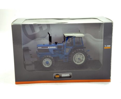 UH 1/32 Ford 8830 Tractor. Looks to be complete, excellent and with original box/boxes.
