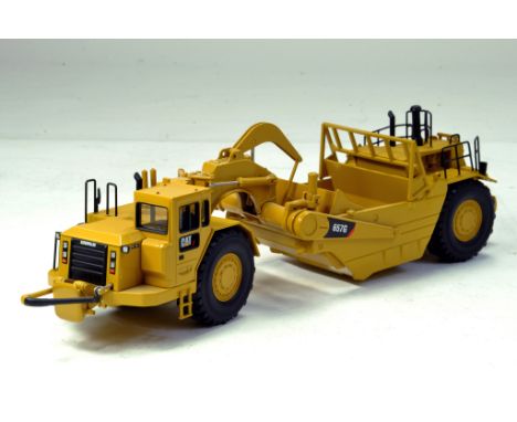 Norscot 1/50 CAT 657G Wheel Tractor Scraper. Looks to be complete, excellent and with original box/boxes.