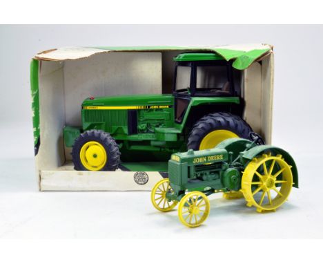 Ertl 1/16 John Deere 4960 Tractor plus one other.  Looks to be complete, excellent and with original box/boxes.