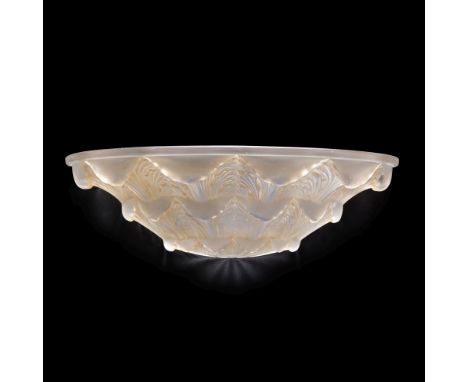 René Lalique'Gaillon' wall light, designed 1927Clear glass, frosted and polished, with sepia staining.45cm wide Wheel cut R.L