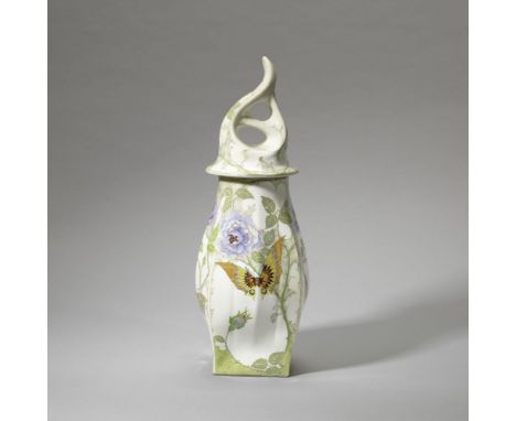 RozenburgVase and cover, circa 1900Eggshell porcelain, vase painted with butterflies and roses, cover with openwork finial.40