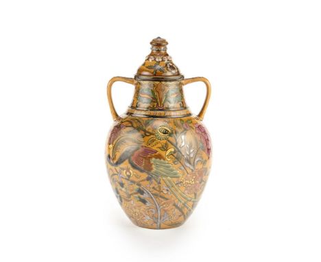 ZsolnayTwo-handled vase and cover, 1883Earthenware, lustre glaze with painted peacock and flower design.41cm highProduced by 