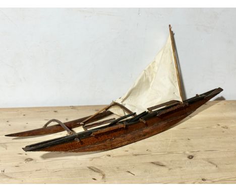 A 19th/early 20th century model Oruwa/outrigger canoe. Sri Lanka. 101cm