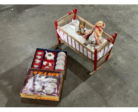 A job lot. Vintage Children’s China tea set, vintage dolls and rocking cot