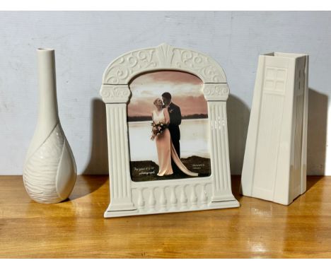 Belleek Pottery. A large photo frame 30x37cm. 2 vases