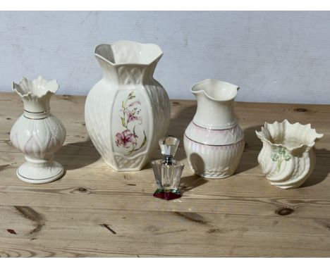 4 pieces of Belleek Pottery and an Art Deco style perfume bottle.