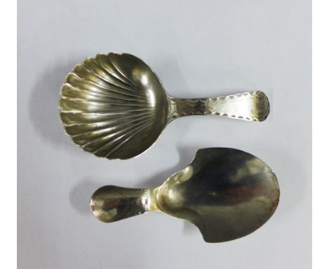 Georgian silver caddy spoon, Birmingham 1796 possibly Joseph Taylor and another with a scalloped shell bowl, 8cm  long (2) 