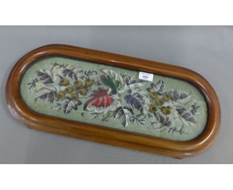 Victorian mahogany framed stand with glazed needle work panel, on four bun feet, 57cm long 