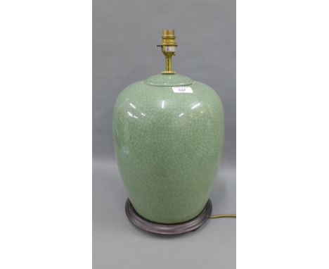 Celadon glazed craquelure table lamp base, on a wooden base, 35cm high excluding fitting