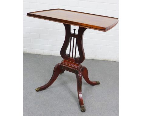 Mahogany occasional table with rectangular top and lyre support and quadruple legs, 72 x 63cm 