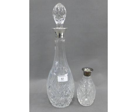 Cut glass decanter and stopper with a Birmingham silver collar, 41cm high, together with another smaller (2) 