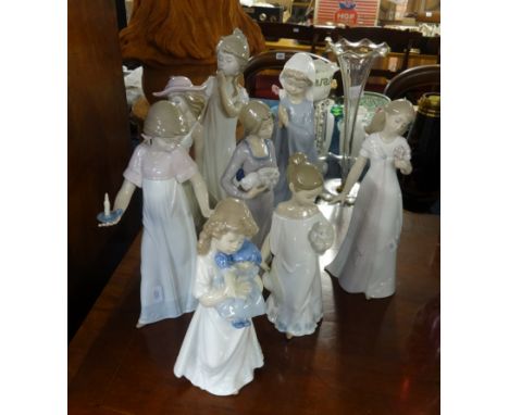 Eight Nao porcelain figures