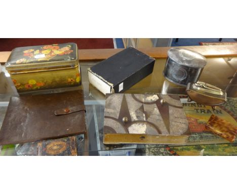 A collection of various silver plated wares including photo frames, lighters, tea caddy, playing cards, No.1A pocket Kodak ca