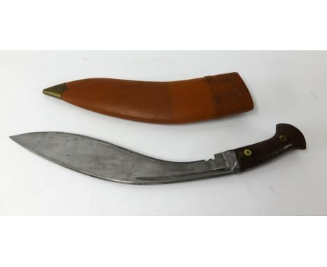 An Army Traders Durrani India 1942 issue kukri knife with modern scabbard.