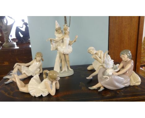 Three Lladro ballerina figures and two Nao figures (5).