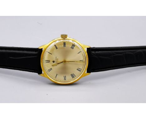 JUNGHANS MEISTER VINTAGE ARMBANDUHR, vergoldetes Gehäuse, goldfarbenes Zifferblatt mit römischen Ziffern und äußerer Minuteri