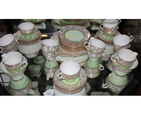A Royal Stafford green and gilt porcelain tea-service, fourty-two pieces