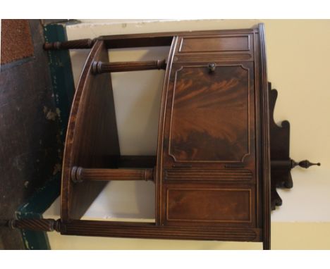 A corner cabinet with lower shelf, 108cm high