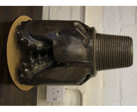A Tricone Drill Bit for oil-gas-water well drilling: impressed neck-rim marks '8 1/2 S84F SER 979980, made in U.S.A.', rotary