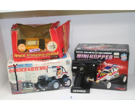 Boxed Taiyo Mini Hopper, 4 x 4 Winch White Wolf and a Ford Sierra XR41 