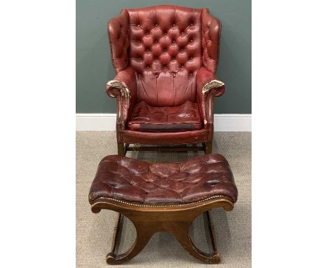 ANTIQUE WING BACK ARMCHAIR & STOOL, upholstered in red leather, with button and studded back and similar style footstoolProve