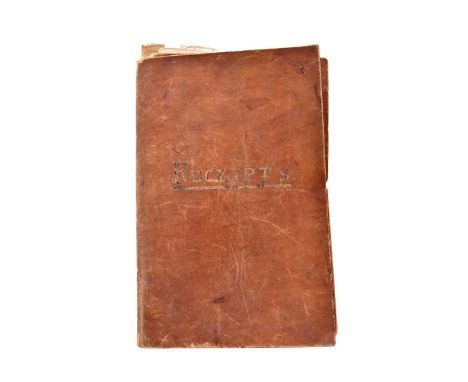 MANUSCRIPT RECIPE AND RECEIPT BOOK, mid 19th century. Circa 100 pages, with a few pasted-in cuttings of cures, and loosely in