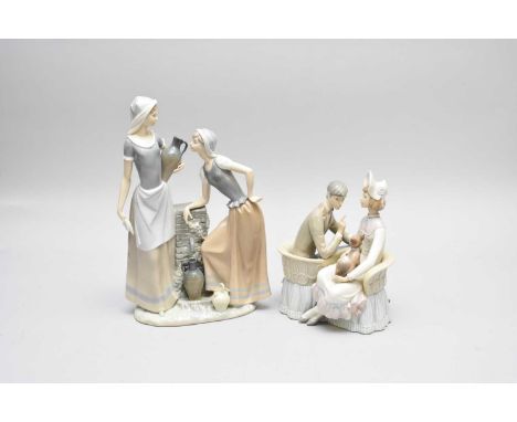 A Nao by Lladro porcelain model of two females collecting water from a pump, 39.5cm high together with a Lladro model of a co