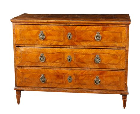 A NORTH ITALIAN WALNUT COMMODE Late 18th century, with rectangular top, above three long drawers on square tapering later leg