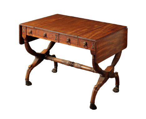 A REGENCY MAHOGANY SOFA TABLE Early 19th century, in the manner of John McLean, the rounded rectangular twin-flap top with a 